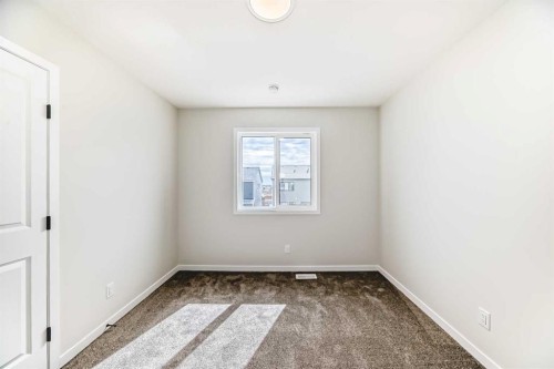 1069 Sawgrass Link Nw, Airdrie, AB - Indoor Photo Showing Other Room