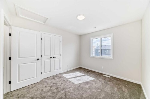 1069 Sawgrass Link Nw, Airdrie, AB - Indoor Photo Showing Other Room