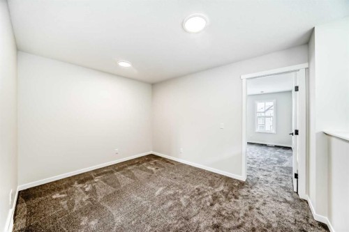 1069 Sawgrass Link Nw, Airdrie, AB - Indoor Photo Showing Other Room