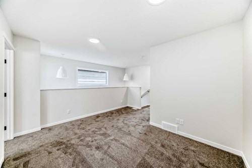 1069 Sawgrass Link Nw, Airdrie, AB - Indoor Photo Showing Other Room