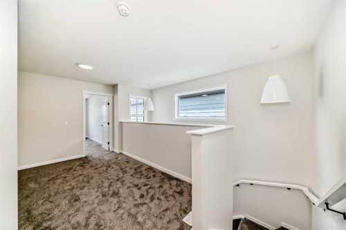 1069 Sawgrass Link Nw, Airdrie, AB - Indoor Photo Showing Other Room