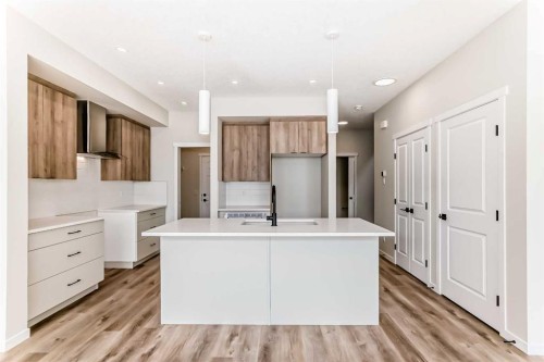 1069 Sawgrass Link Nw, Airdrie, AB - Indoor Photo Showing Kitchen