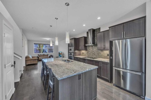 342 Chaparral Valley Drive Se, Calgary, AB - Indoor Photo Showing Kitchen With Stainless Steel Kitchen With Double Sink With Upgraded Kitchen