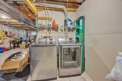 342 Chaparral Valley Drive Se, Calgary, AB - Indoor Photo Showing Laundry Room