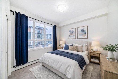 211-10 Walgrove Se, Calgary, AB - Indoor Photo Showing Bedroom