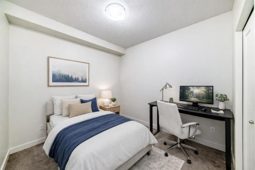 211-10 Walgrove Se, Calgary, AB - Indoor Photo Showing Bedroom