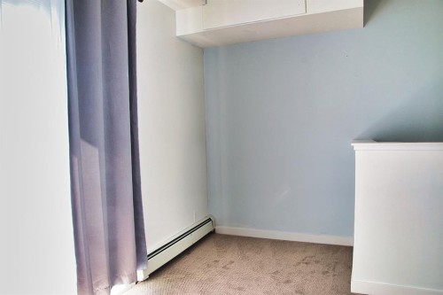 112-1740 9 Street Nw, Calgary, AB - Indoor Photo Showing Other Room