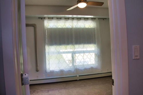 112-1740 9 Street Nw, Calgary, AB - Indoor Photo Showing Other Room