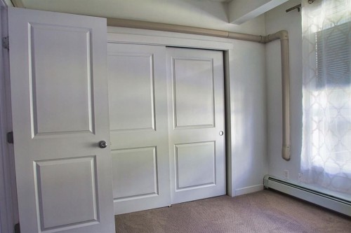 112-1740 9 Street Nw, Calgary, AB - Indoor Photo Showing Other Room