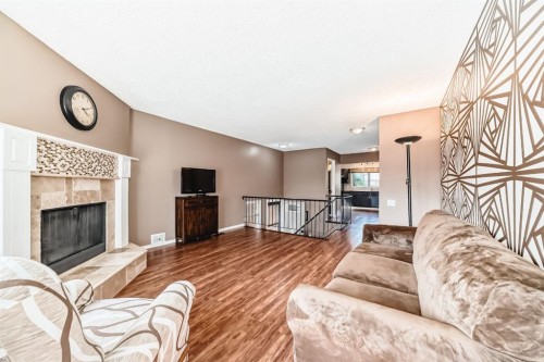 244 Whiteridge Place Ne, Calgary, AB - Indoor Photo Showing Living Room With Fireplace