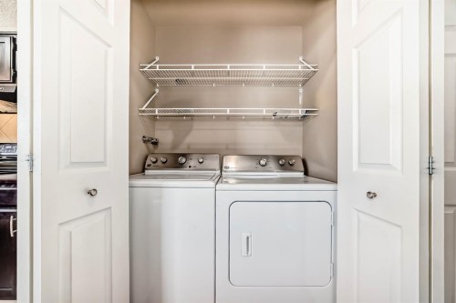 244 Whiteridge Place Ne, Calgary, AB - Indoor Photo Showing Laundry Room