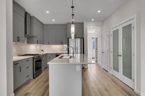 106 Corner Glen Grove Ne, Calgary, AB - Indoor Photo Showing Kitchen With Double Sink With Upgraded Kitchen