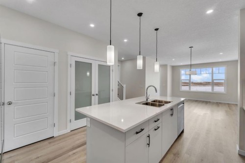 106 Corner Glen Grove Ne, Calgary, AB - Indoor Photo Showing Kitchen With Double Sink With Upgraded Kitchen