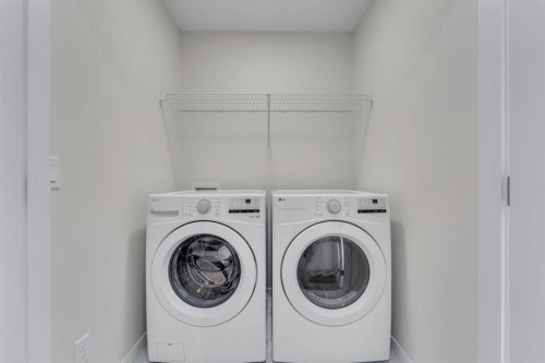 106 Corner Glen Grove Ne, Calgary, AB - Indoor Photo Showing Laundry Room