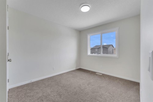 106 Corner Glen Grove Ne, Calgary, AB - Indoor Photo Showing Other Room