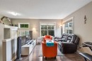 319 Mckenzie Towne Square Se, Calgary, AB  - Indoor Photo Showing Living Room 