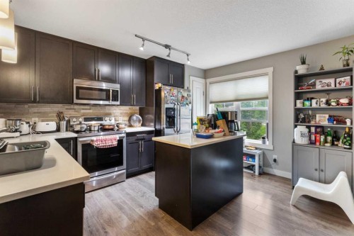 319 Mckenzie Towne Square Se, Calgary, AB - Indoor Photo Showing Kitchen With Stainless Steel Kitchen
