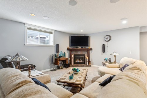 135 Auburn Sound Manor Se, Calgary, AB - Indoor Photo Showing Living Room With Fireplace