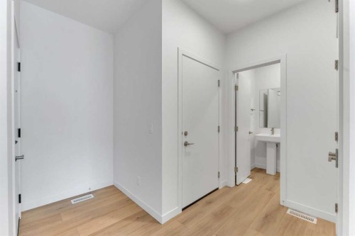 15 Heritage Heath, Cochrane, AB - Indoor Photo Showing Other Room