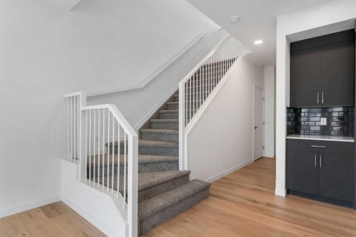 15 Heritage Heath, Cochrane, AB - Indoor Photo Showing Other Room