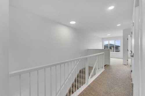15 Heritage Heath, Cochrane, AB - Indoor Photo Showing Other Room
