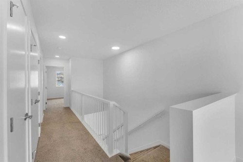 15 Heritage Heath, Cochrane, AB - Indoor Photo Showing Other Room