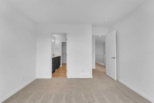 15 Heritage Heath, Cochrane, AB - Indoor Photo Showing Other Room
