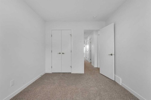 15 Heritage Heath, Cochrane, AB - Indoor Photo Showing Other Room