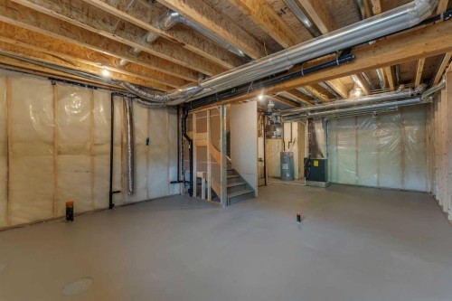 15 Heritage Heath, Cochrane, AB - Indoor Photo Showing Basement