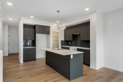 15 Heritage Heath, Cochrane, AB - Indoor Photo Showing Kitchen