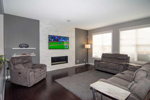 119 Auburn Bay Avenue Se, Calgary, AB - Indoor Photo Showing Living Room With Fireplace