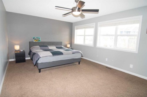 119 Auburn Bay Avenue Se, Calgary, AB - Indoor Photo Showing Bedroom
