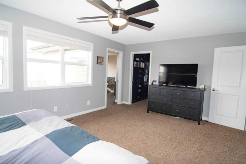 119 Auburn Bay Avenue Se, Calgary, AB - Indoor Photo Showing Bedroom