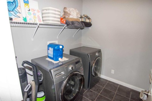 119 Auburn Bay Avenue Se, Calgary, AB - Indoor Photo Showing Laundry Room