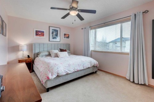 41 Chapman Close Se, Calgary, AB - Indoor Photo Showing Bedroom