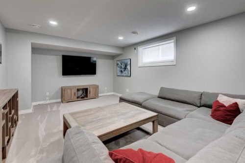 41 Chapman Close Se, Calgary, AB - Indoor With Fireplace