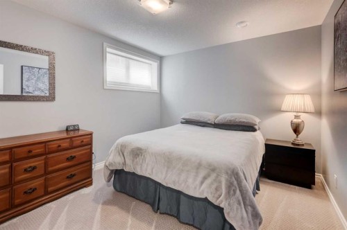 41 Chapman Close Se, Calgary, AB - Indoor Photo Showing Bedroom