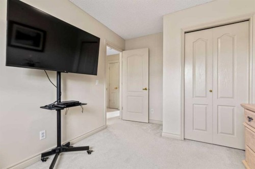 310 Somerset Drive Sw, Calgary, AB - Indoor Photo Showing Gym Room
