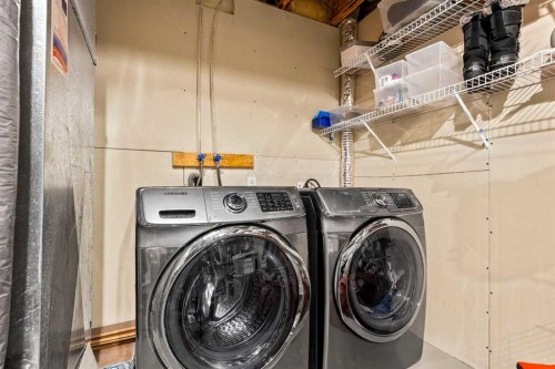 310 Somerset Drive Sw, Calgary, AB - Indoor Photo Showing Laundry Room