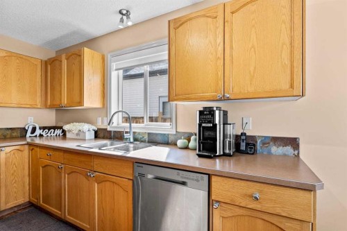 310 Somerset Drive Sw, Calgary, AB - Indoor Photo Showing Kitchen With Double Sink