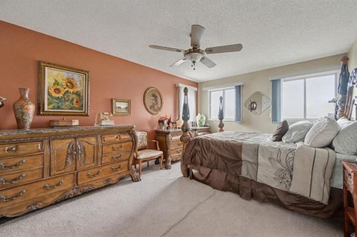 983 Woodbine Boulevard Sw, Calgary, AB - Indoor Photo Showing Bedroom