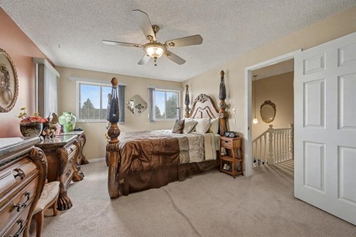 983 Woodbine Boulevard Sw, Calgary, AB - Indoor Photo Showing Bedroom