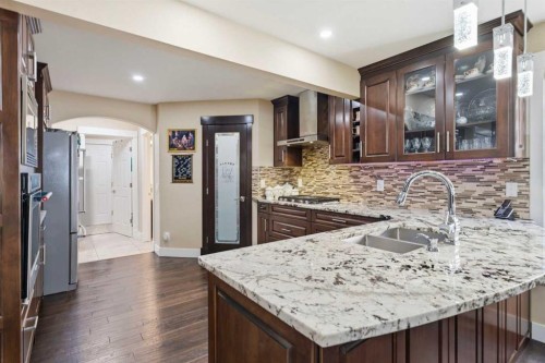 171 Coral Springs Park Ne, Calgary, AB - Indoor Photo Showing Kitchen With Double Sink With Upgraded Kitchen