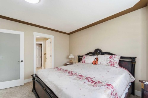 171 Coral Springs Park Ne, Calgary, AB - Indoor Photo Showing Bedroom