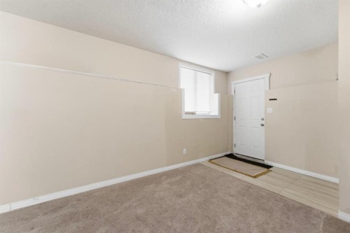 171 Coral Springs Park Ne, Calgary, AB - Indoor Photo Showing Other Room