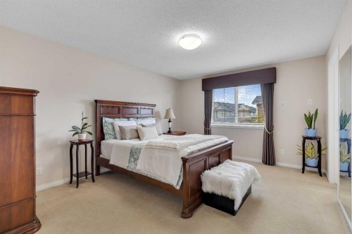 32 Panatella Row Nw, Calgary, AB - Indoor Photo Showing Bedroom