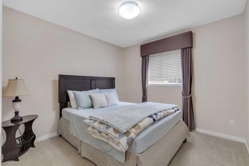 32 Panatella Row Nw, Calgary, AB - Indoor Photo Showing Bedroom