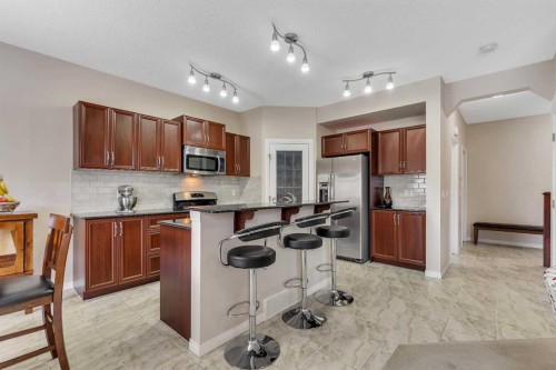 32 Panatella Row Nw, Calgary, AB - Indoor Photo Showing Kitchen With Stainless Steel Kitchen