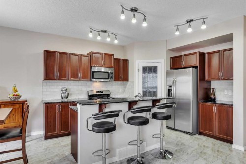 32 Panatella Row Nw, Calgary, AB - Indoor Photo Showing Kitchen With Stainless Steel Kitchen