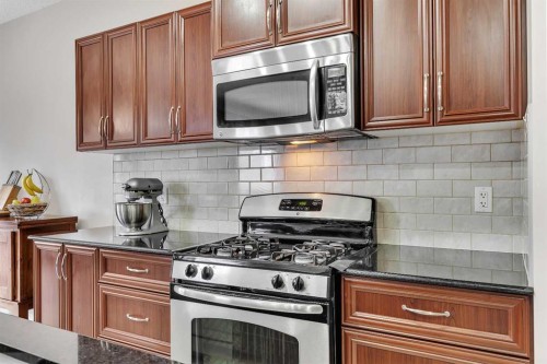 32 Panatella Row Nw, Calgary, AB - Indoor Photo Showing Kitchen